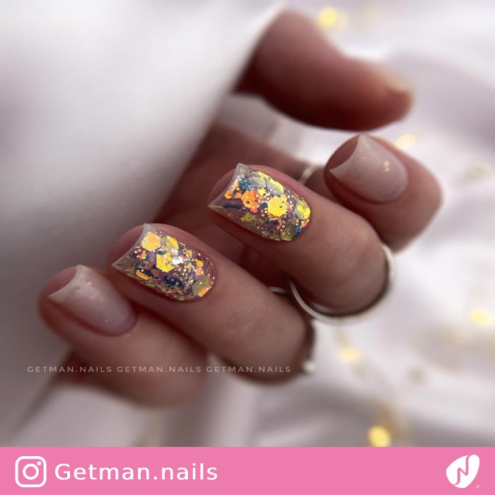 Glossy Nails with Confetti Design